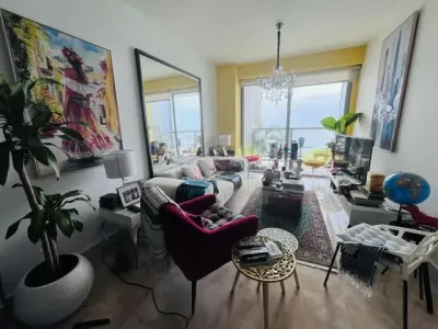 Apartamento de 124 m² en yoo panamá sobre avenida balboa, con 1 recámara, 1.5 baños y balcón co